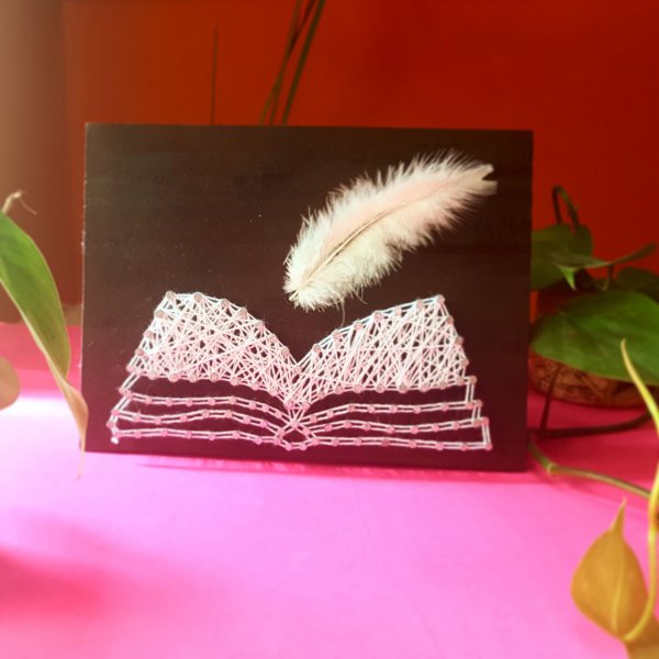 Writing on Book String Art by Sonal Malhotra