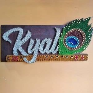 kyal peacock nameplate string art